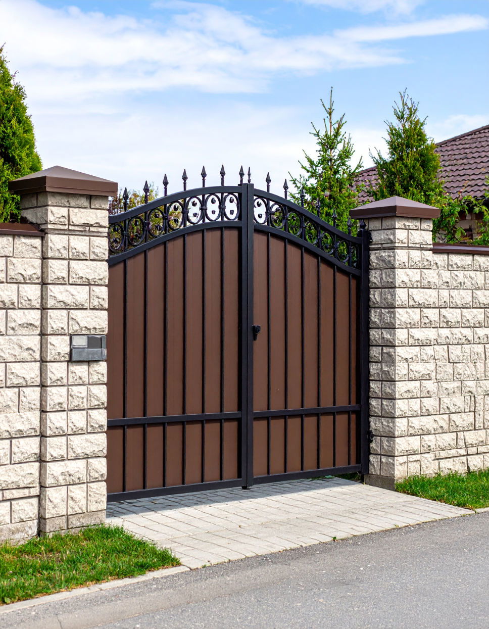 Cinder Block Fence with Rustic Metal Gates Cinder Block Fence Ideas