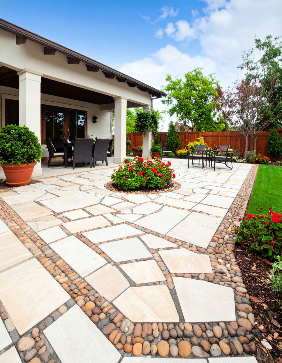 Flagstone Patio Design with Decorative Inlays