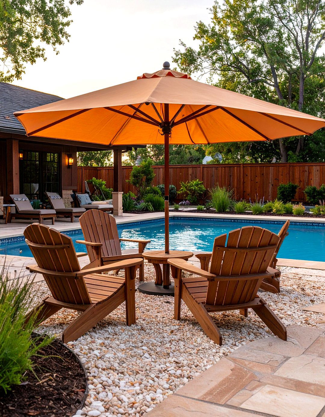 Adirondack Nook with Shade Sail Beside an Above Ground Pool - 25 above ground pool landscaping ideas