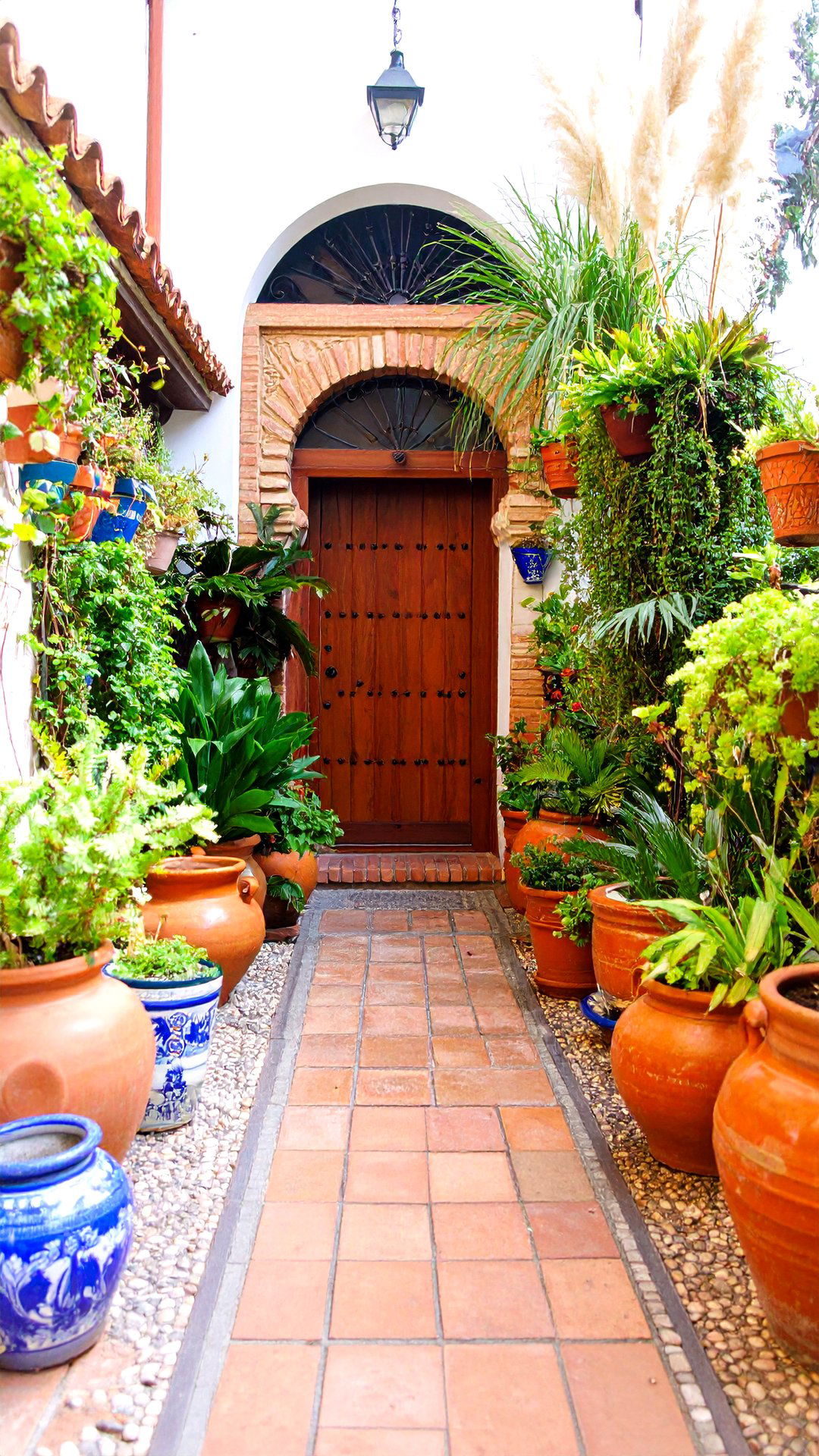 Mixed Ceramic Planters Color a Boho House Exterior Entry - 25 boho house exterior ideas
